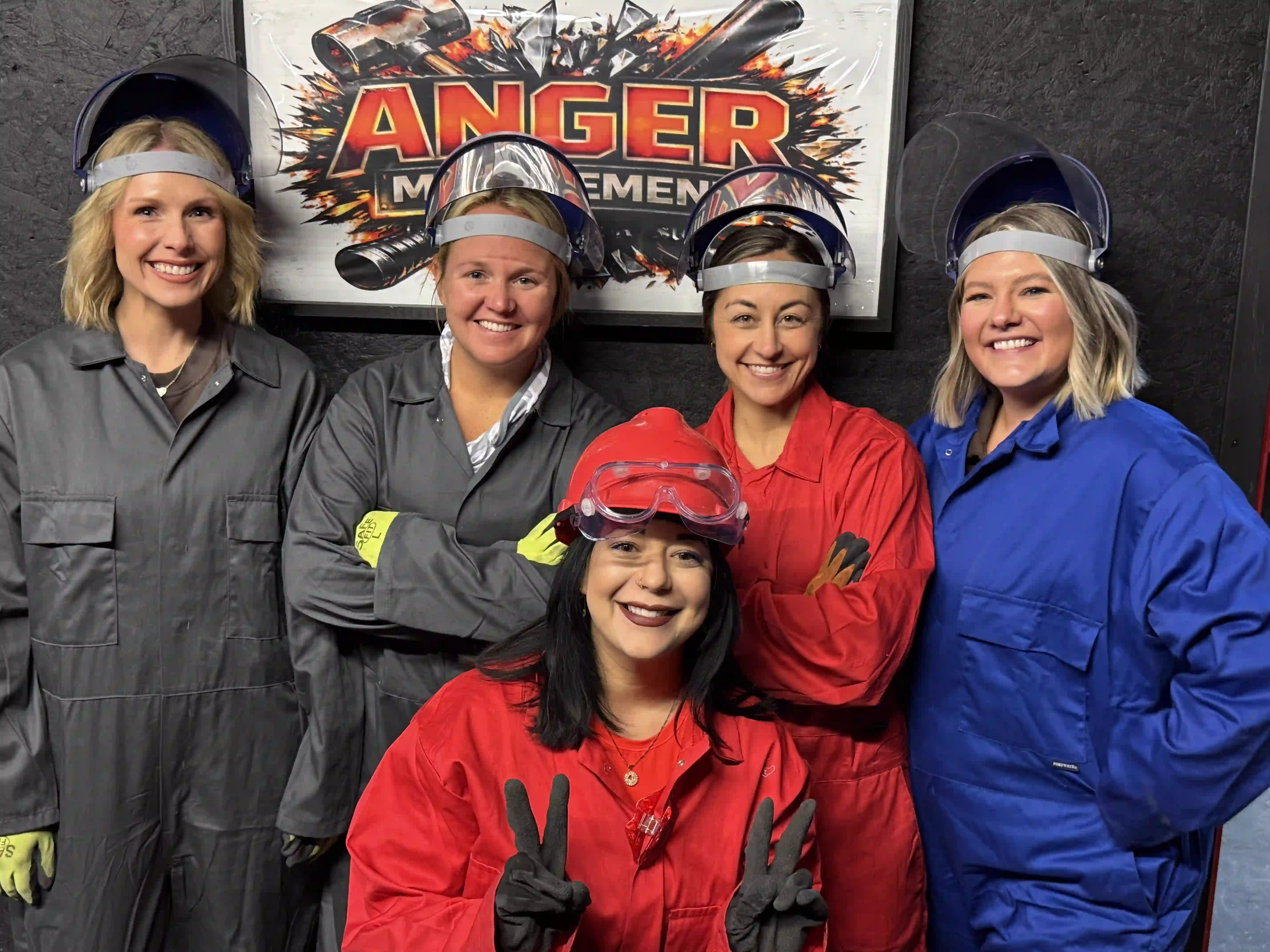 Group in coveralls and face shields at Anger Management 785